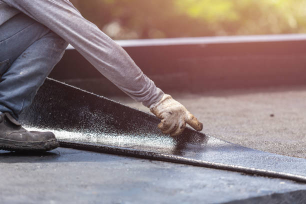 Professional Waterproofing technician working in Bowmansville, NY